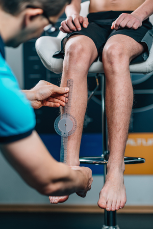 Physical Therapist doing Anthropometric Measuring の写真素材