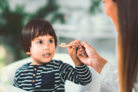Little boy and homeopath treatment conceptの写真素材