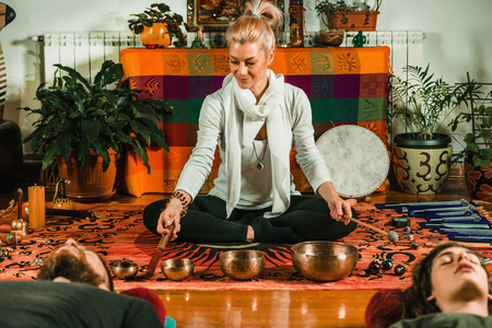 Tibetan singing bowl in sound therapyの写真素材