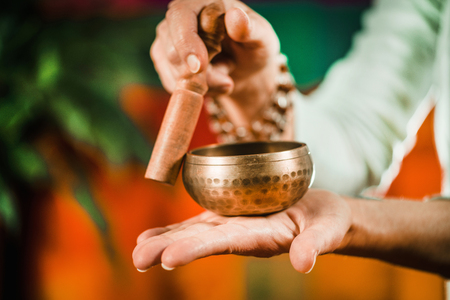 Tibetan singing bowl in sound therapyの写真素材