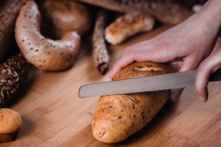 Slicing bread, close up