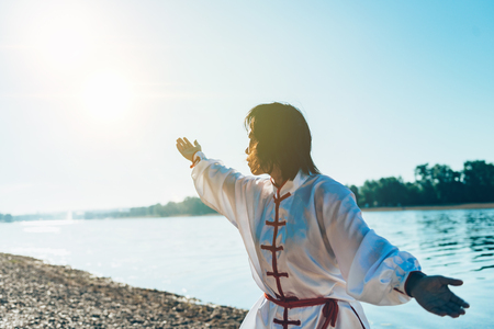 Tai Chi by the lakeの写真素材