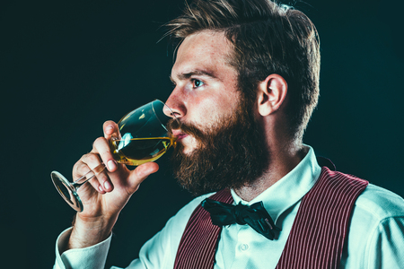 Sommelier tasting white wineの写真素材