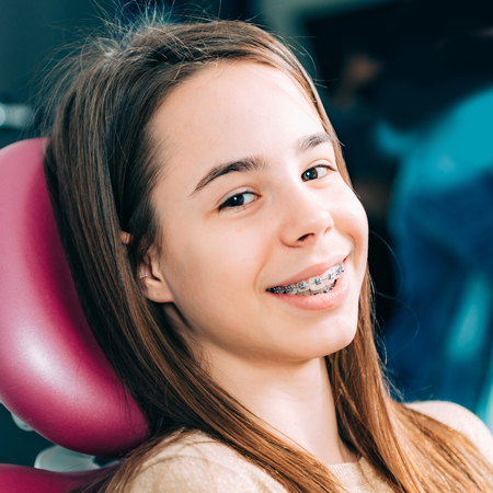 Portrait of girl with dental bracesの写真素材