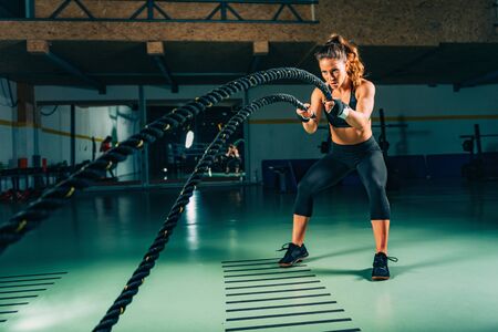 Cross training. Rope swing exerciseの写真素材