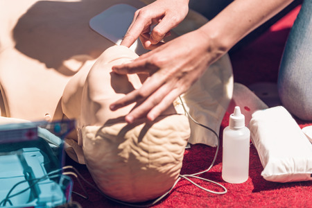 First Aid Training. Defibrillator CPR Practice