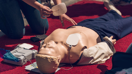 First Aid Training. Defibrillator CPR Practiceの写真素材