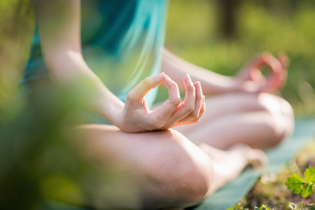 Yoga detail, lotus position mudra. の写真素材