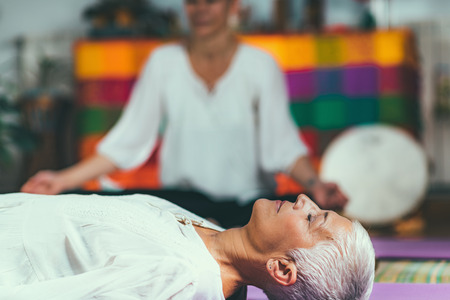 Tibetan singing bowl in sound meditation therapyの写真素材