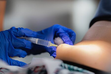 Woman having lipolysis treatment of the abdominal region. Aesthetic Medicineの写真素材