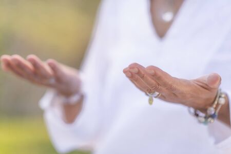 Feeling in Balance. Balancing energy meditation outdoors. Self-care wellbeing practice 