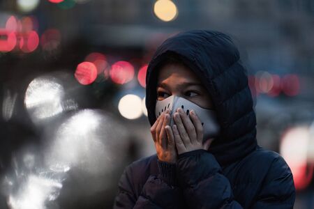 Polluted Air in the City. Wearing protective Maskの写真素材