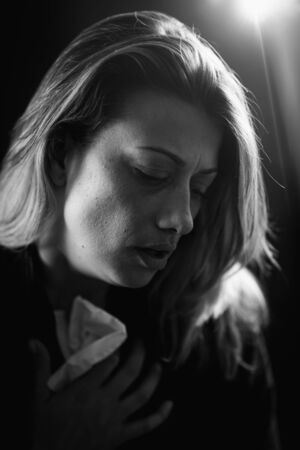 Sadness â Portrait of a miserable woman. Close up image of sad female face. Looking awayの写真素材