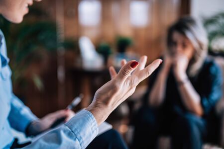 CBT or Cognitive Behavioral Therapy Session, Therapist Talking to Patientの写真素材
