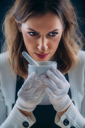Woman Testing Scent of a Homemade Cosmetic Creamの写真素材