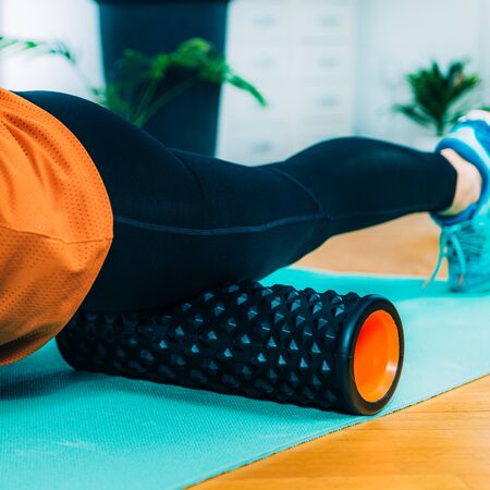 Foam Roller Quadriceps Massageの写真素材