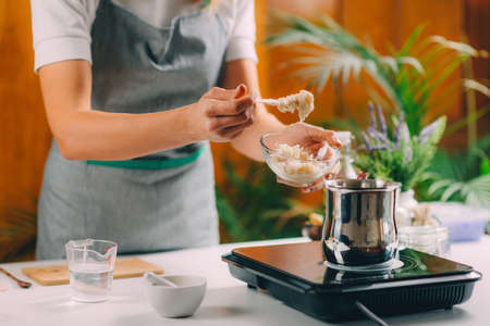 Homemade Soap. Woman Melting Glycerine For Homemade Soap.の写真素材