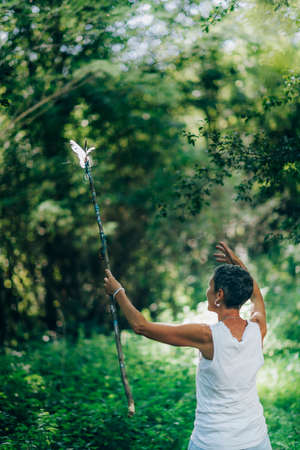 Self-Empowerment concept. Mindful woman seeking a way out of trouble, navigating, looking for a positive affirmationの写真素材