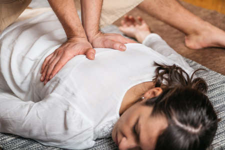 Thai Back Massage and Energy Lines â A Holistic Approach to Healing the Body at Wellness Centerの写真素材