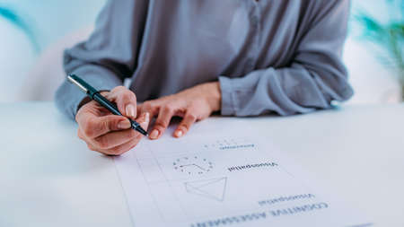 Cognitive test. Senior woman doing cognitive function test