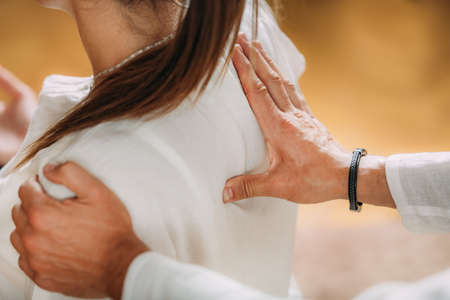 Woman enjoying shiatsu neck and shoulders massage.の写真素材