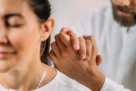Woman enjoying shiatsu neck and shoulders massage.の写真素材