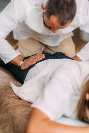Shiatsu treatment for sciatica painの写真素材