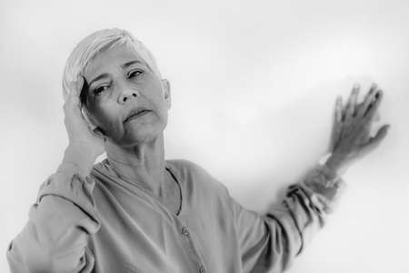 Vertigo. Senior woman suffering from vertigo dizziness.の写真素材