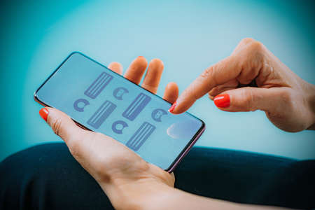 Chatbot - digital robot assistant helping a customer.の写真素材