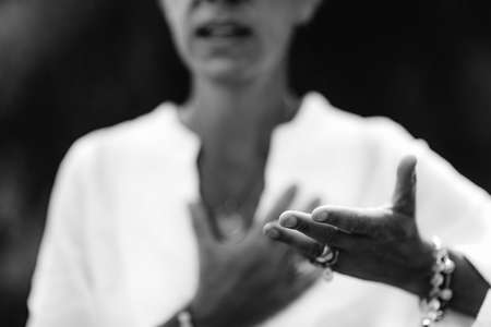Spiritual Healer Expressing Honesty with her Hands