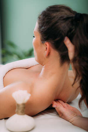 Ayurveda Kizhi Massage with Herbal Bolus Bagsの写真素材