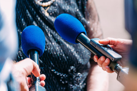 Press interview outdoorsの写真素材