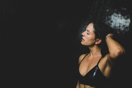 Beautiful Woman Taking a Shower after Spa Center Sauna.