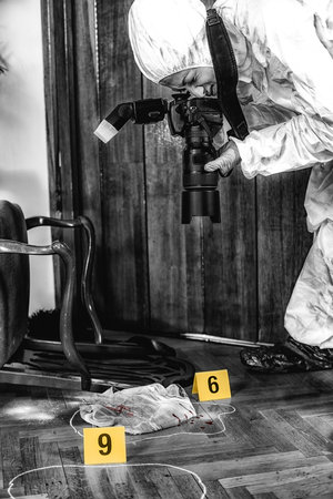 Police Forensic Detective Photographing Crime Scene, Collecting Evidenceの写真素材