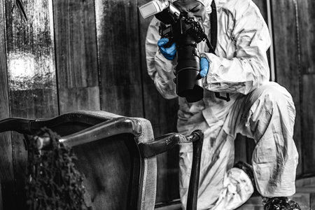 Police Forensic Detective Photographing Crime Scene, Collecting Evidenceの写真素材
