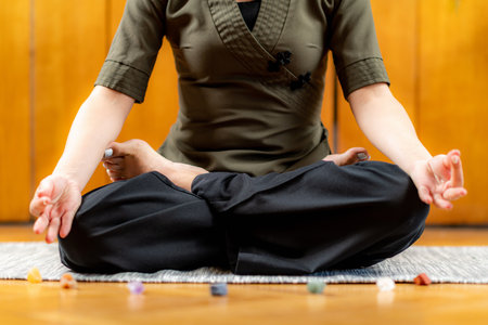 Woman Meditating. Sitting in Lotus Position.