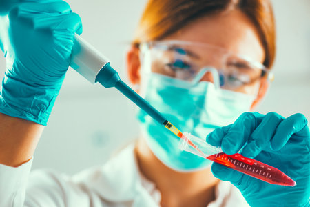 Stem cell researcher working in laboratoryの写真素材