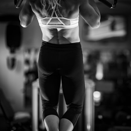 Female Athlete Exercising in the gym, black and whiteの写真素材