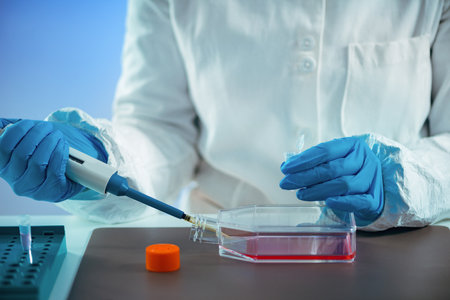Biotechnology. Female scientist working in laboratoryの写真素材