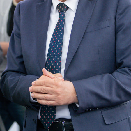 Business professional at a technology trade show, embodying expertise and professionalism.