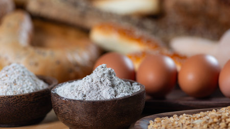 Iintegral flour up close in rustic wooden bowl.