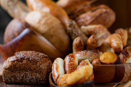 A table adorned with baked delights. Indulge in homemade quality pastries, breads, and moreの写真素材
