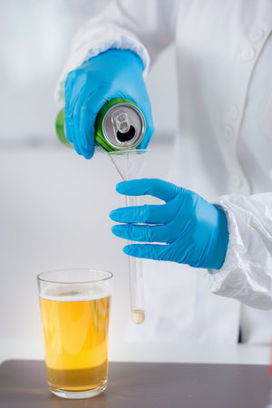 Inspecting beer quality control in the labの写真素材