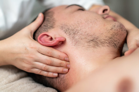 Rejuvenating face massage for men, focusing on relieving tension, improving blood circulation, and...