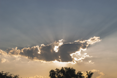 light of sun behind cloudの写真素材