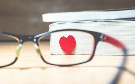 red heart behind glassesの写真素材