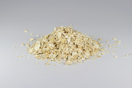 Rough oatmeal on gray backgroundの写真素材