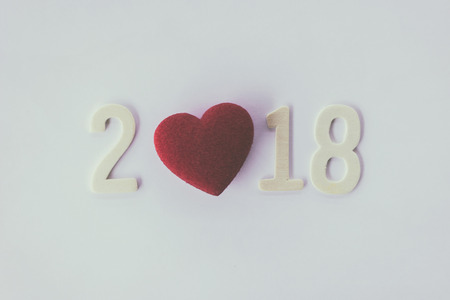 Vintage red heart and 2018 on vintage white backgroundの写真素材