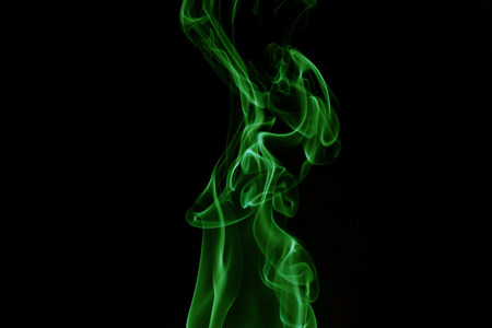 Green smoke on black backgroundの写真素材