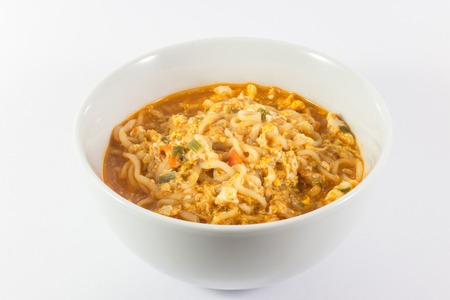 Instant noodle in white bowl on white backgroundの写真素材